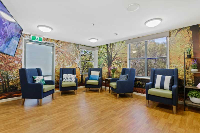 Doutta Galla Avondale - sitting room with tree wallpaper
